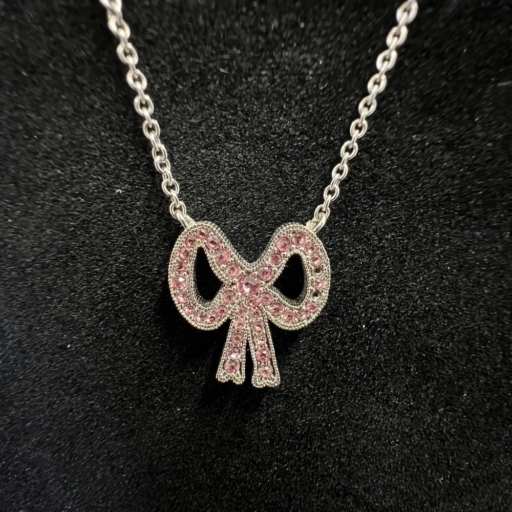 Coach Silver Tone Pink Pave Crystal Bow Pendant Necklace 17 Inch Chain